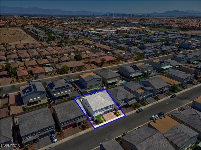 7260 Grace Estate Ave, Las Vegas, NV 89113 - aerial view of residential area featuring a mountain backdrop and property parcel outlined