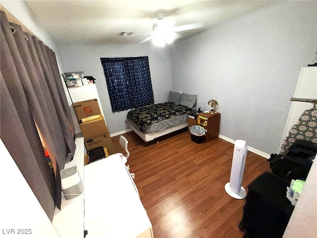 6351 Davidson Ct, Las Vegas, NV 89110 - bedroom featuring wood finished floors, baseboards, and ceiling fan