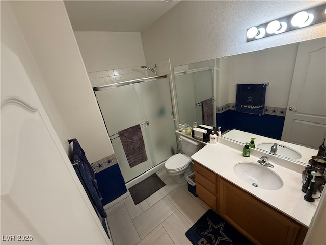 6351 Davidson Ct, Las Vegas, NV 89110 - bathroom with a shower stall, toilet, and vanity