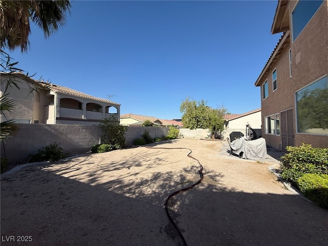 6351 Davidson Ct, Las Vegas, NV 89110 - fenced backyard with a patio area