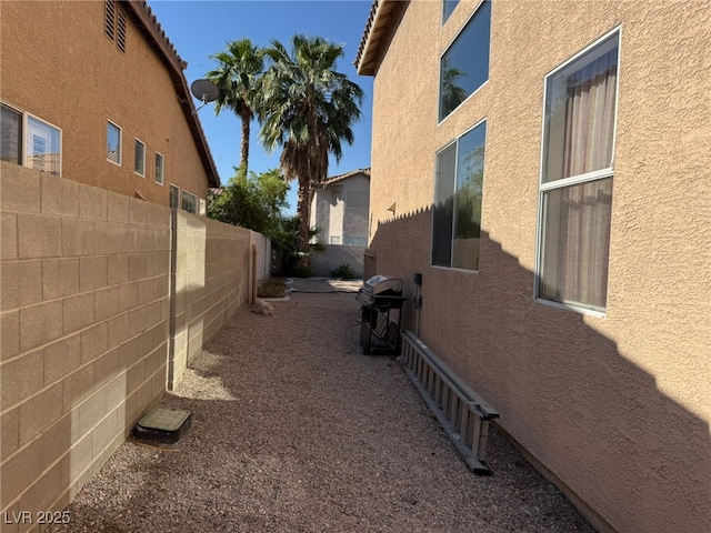6351 Davidson Ct, Las Vegas, NV 89110 - view of side of property with stucco siding