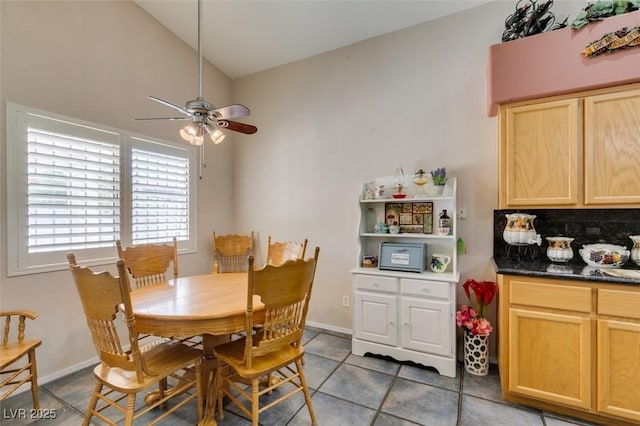 1017 Guided Dancer Ave, Henderson, NV 89015 - dining area with ceiling fan, lofted ceiling, and light tile patterned floors