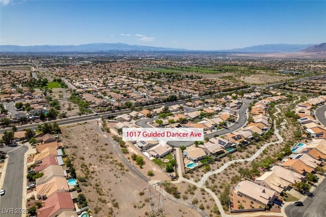 1017 Guided Dancer Ave, Henderson, NV 89015 - aerial view of property's location with a mountainous background and nearby suburban area