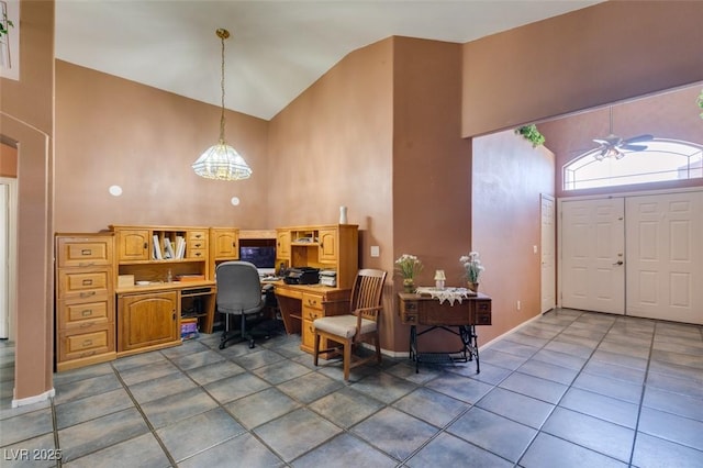 1017 Guided Dancer Ave, Henderson, NV 89015 - tiled office space with high vaulted ceiling, built in study area, and a ceiling fan