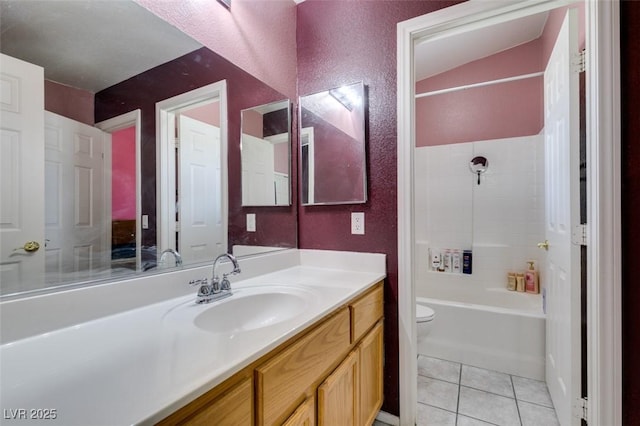 1017 Guided Dancer Ave, Henderson, NV 89015 - full bath featuring vanity, toilet, tile patterned floors, tub / shower combination, and vaulted ceiling