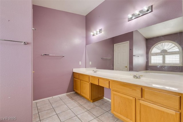 1017 Guided Dancer Ave, Henderson, NV 89015 - bathroom featuring double vanity, tile patterned floors, a bath, and baseboards
