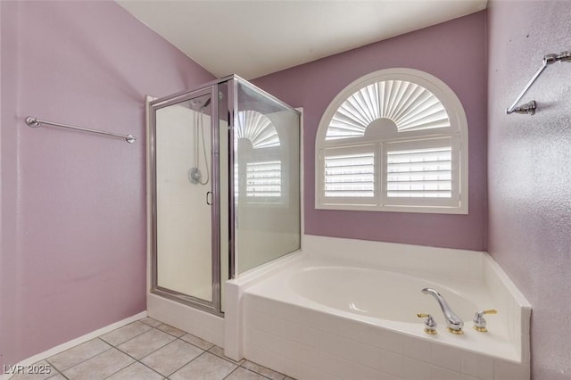 1017 Guided Dancer Ave, Henderson, NV 89015 - full bath featuring tile patterned flooring, a stall shower, and a garden tub