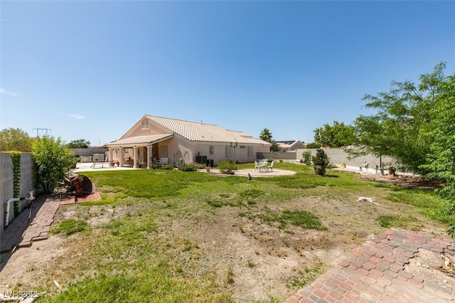 1017 Guided Dancer Ave, Henderson, NV 89015 - fenced backyard featuring a patio
