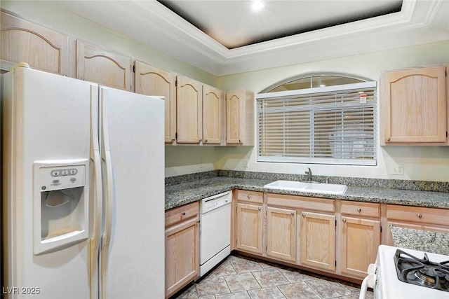 8725 Red Rio Dr Unit 203, Las Vegas, NV 89128 - kitchen with white appliances, light brown cabinetry, a sink, a raised ceiling, and light tile patterned flooring
