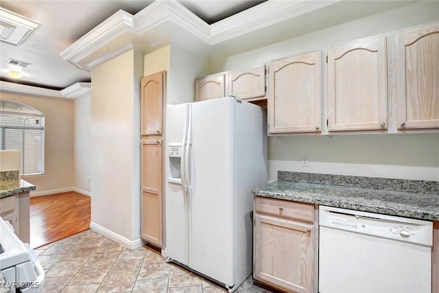 8725 Red Rio Dr Unit 203, Las Vegas, NV 89128 - kitchen featuring white appliances, crown molding, light brown cabinetry, and light stone counters