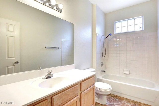 8725 Red Rio Dr Unit 203, Las Vegas, NV 89128 - bathroom featuring toilet, vanity, tub / shower combination, and tile patterned flooring