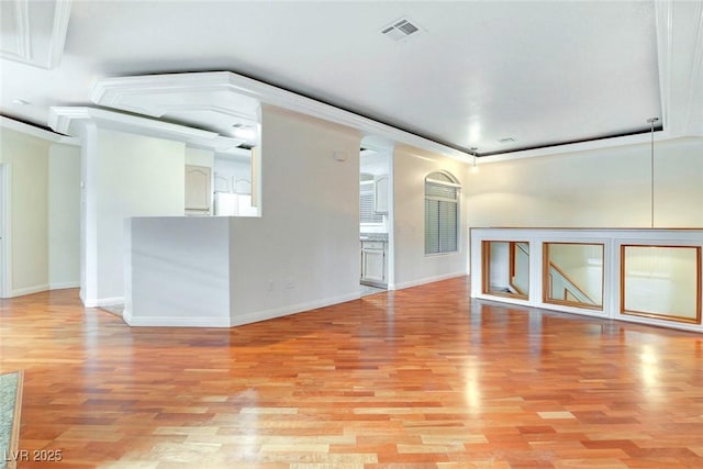 8725 Red Rio Dr Unit 203, Las Vegas, NV 89128 - unfurnished living room featuring light wood-style flooring and baseboards