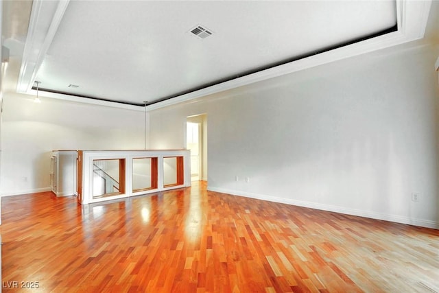 8725 Red Rio Dr Unit 203, Las Vegas, NV 89128 - unfurnished room featuring wood finished floors and baseboards