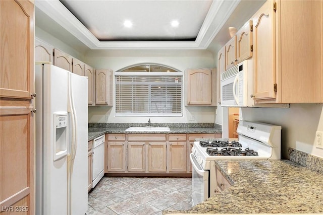 8725 Red Rio Dr Unit 203, Las Vegas, NV 89128 - kitchen featuring white appliances, light brown cabinetry, a sink, ornamental molding, and a raised ceiling