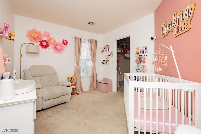 561 Fork Mesa Ct, Henderson, NV 89015 - bedroom with light carpet and a nursery area