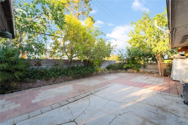 6608 Burgundy Way, Las Vegas, NV 89107 - fenced backyard featuring a patio