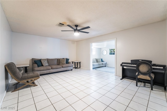 6608 Burgundy Way, Las Vegas, NV 89107 - living area with ceiling fan and light tile patterned flooring
