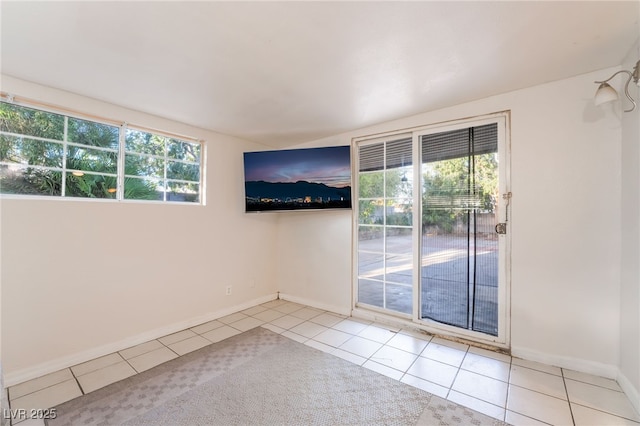 6608 Burgundy Way, Las Vegas, NV 89107 - spare room featuring tile patterned floors and baseboards