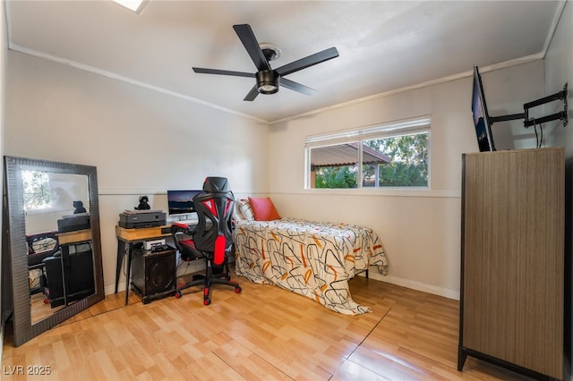 6608 Burgundy Way, Las Vegas, NV 89107 - bedroom featuring crown molding, wood finished floors, baseboards, an office area, and a ceiling fan