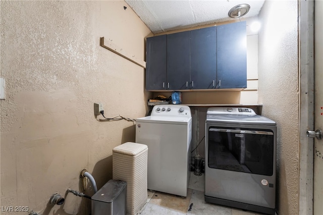 6608 Burgundy Way, Las Vegas, NV 89107 - washroom featuring cabinet space and washer and clothes dryer