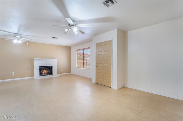 411 Monmouth Ct, Henderson, NV 89015 - unfurnished living room featuring a ceiling fan, a brick fireplace, and baseboards