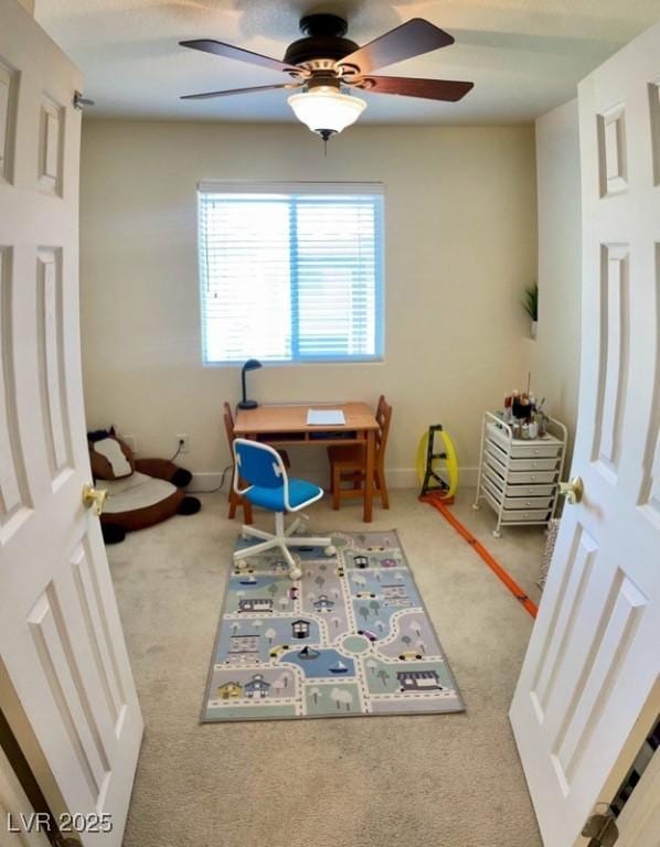 11074 Caramel Crest Ct, Las Vegas, NV 89135 - office area featuring carpet, a ceiling fan, and baseboards
