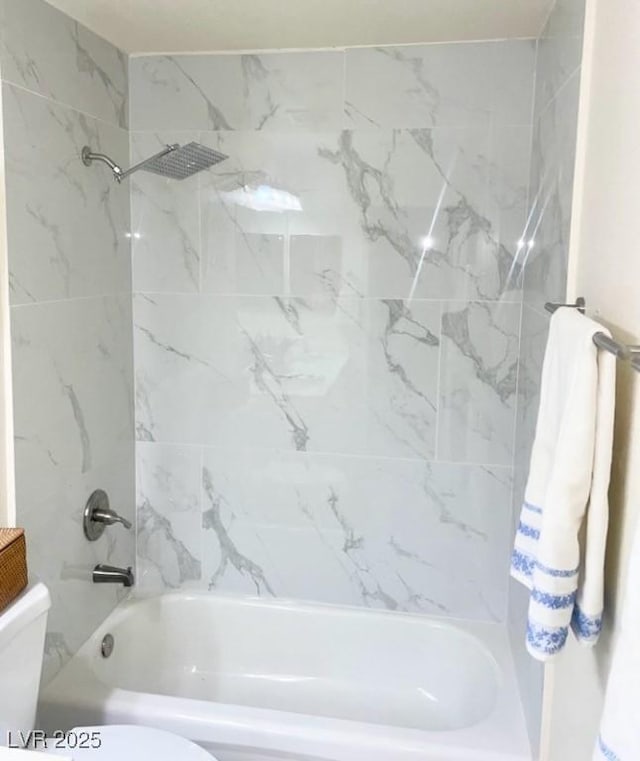 11074 Caramel Crest Ct, Las Vegas, NV 89135 - bathroom featuring toilet and shower / washtub combination