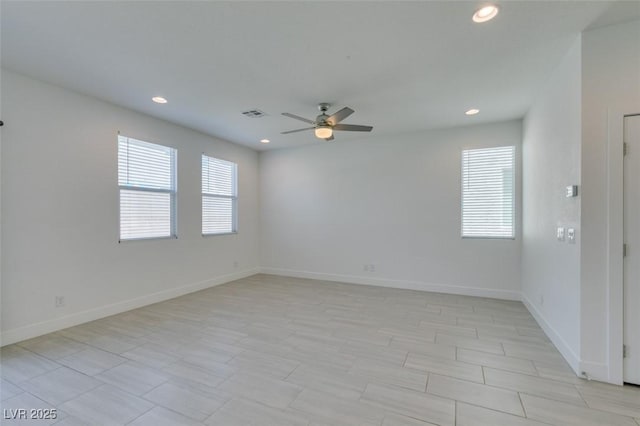 4633 Fragrant St, North Las Vegas, NV 89031 - spare room featuring ceiling fan, healthy amount of natural light, recessed lighting, and baseboards