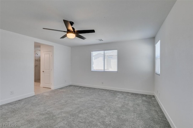 4633 Fragrant St, North Las Vegas, NV 89031 - unfurnished room featuring healthy amount of natural light, carpet, ceiling fan, and baseboards