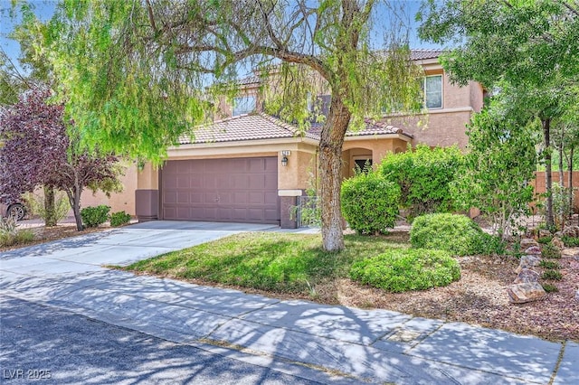 529 Caribbean Palm Dr, Las Vegas, NV 89138 - view of front facade with stucco siding, a tile roof, a garage, and concrete driveway