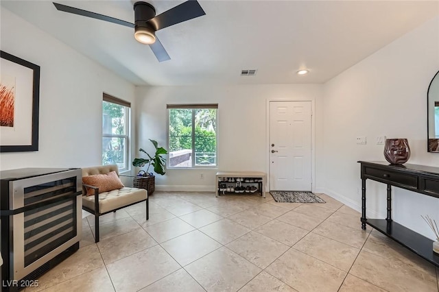 529 Caribbean Palm Dr, Las Vegas, NV 89138 - living area featuring wine cooler, light tile patterned floors, a ceiling fan, baseboards, and recessed lighting