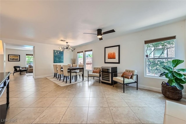 529 Caribbean Palm Dr, Las Vegas, NV 89138 - living area featuring a chandelier, light tile patterned floors, baseboards, and ceiling fan