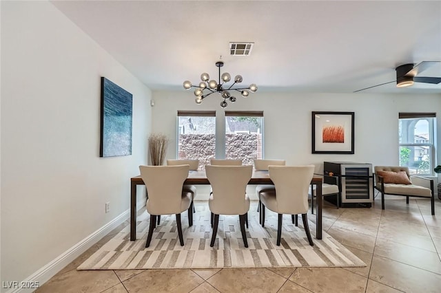 529 Caribbean Palm Dr, Las Vegas, NV 89138 - dining space with a chandelier, light tile patterned floors, and baseboards