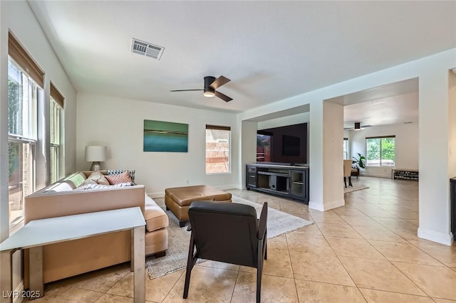 529 Caribbean Palm Dr, Las Vegas, NV 89138 - living area featuring a ceiling fan, light tile patterned floors, and baseboards