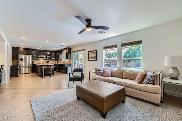529 Caribbean Palm Dr, Las Vegas, NV 89138 - living room featuring ceiling fan, light tile patterned floors, and baseboards