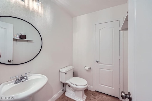 529 Caribbean Palm Dr, Las Vegas, NV 89138 - bathroom with tile patterned flooring, a sink, toilet, and baseboards
