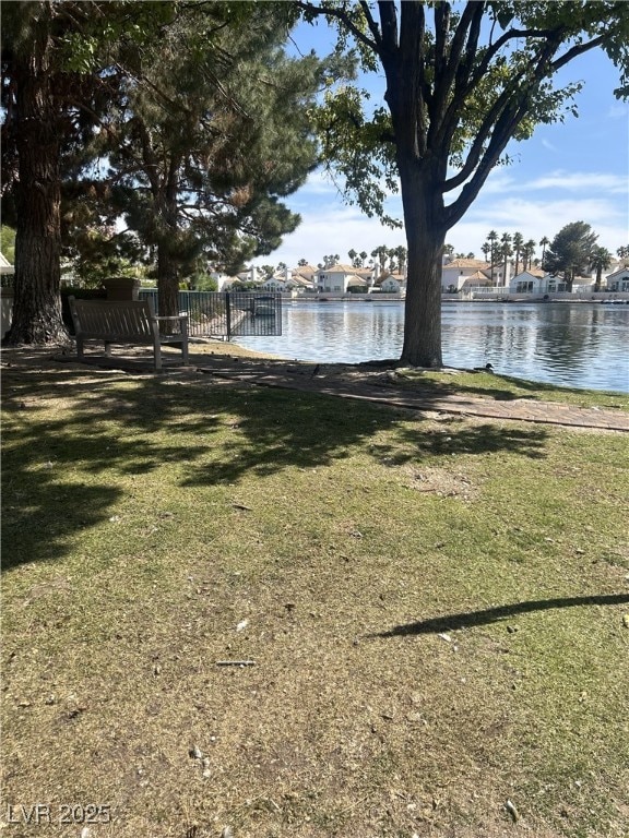 3150 Soft Breezes Dr Unit 1033, Las Vegas, NV 89128 - view of grassy yard featuring a water view