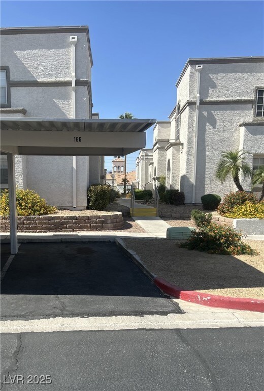 3150 Soft Breezes Dr Unit 1033, Las Vegas, NV 89128 - view of covered parking lot