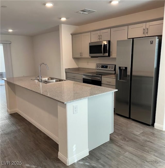 12170 Midnight Pine Rd Unit 3, Las Vegas, NV 89183 - kitchen with appliances with stainless steel finishes, a sink, gray cabinets, light wood finished floors, and recessed lighting
