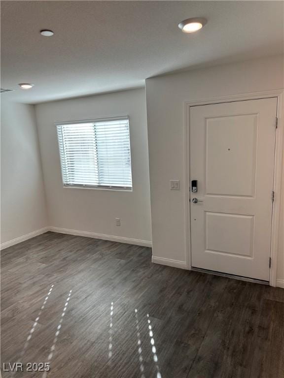 12170 Midnight Pine Rd Unit 3, Las Vegas, NV 89183 - foyer entrance featuring baseboards, dark wood-style flooring, and recessed lighting