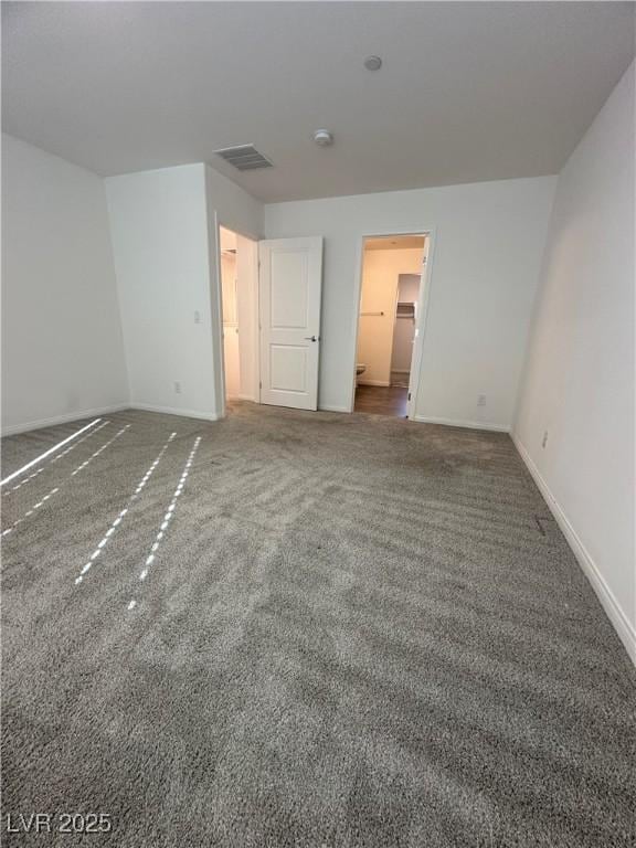 12170 Midnight Pine Rd Unit 3, Las Vegas, NV 89183 - unfurnished bedroom with baseboards and carpet flooring
