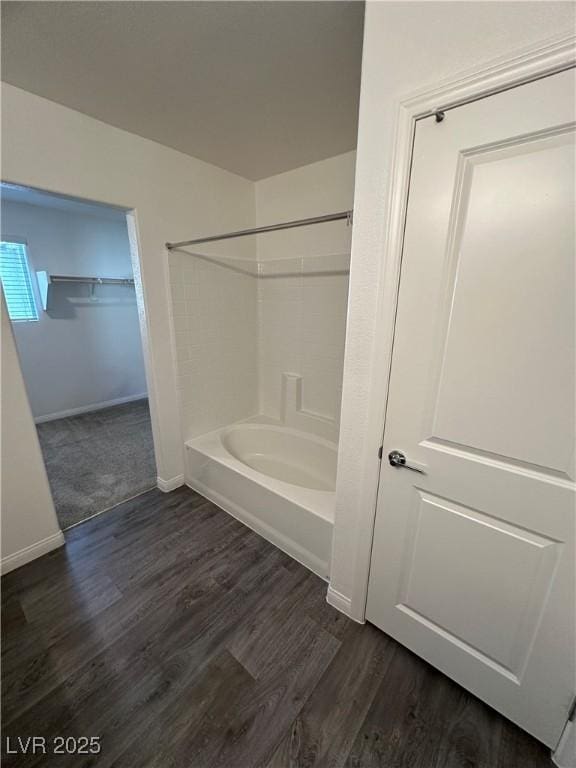 12170 Midnight Pine Rd Unit 3, Las Vegas, NV 89183 - full bathroom featuring shower / bath combination, wood finished floors, baseboards, and a walk in closet