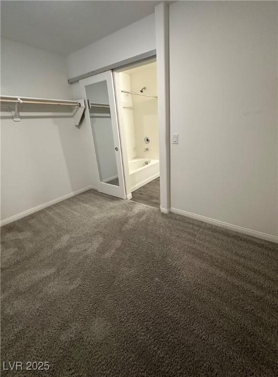 12170 Midnight Pine Rd Unit 3, Las Vegas, NV 89183 - walk in closet featuring carpet flooring