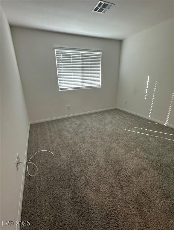 12170 Midnight Pine Rd Unit 3, Las Vegas, NV 89183 - carpeted spare room featuring baseboards