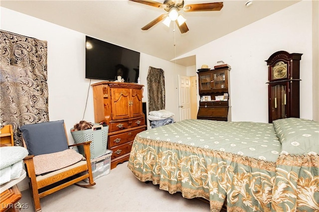 2251 Bridger St, Pahrump, NV 89048 - bedroom with light colored carpet, a ceiling fan, and lofted ceiling