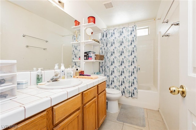 2251 Bridger St, Pahrump, NV 89048 - full bath with vanity, toilet, shower / bath combo, and tile patterned flooring