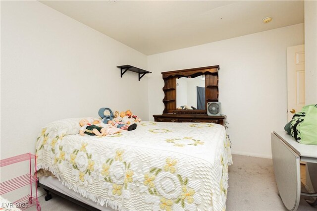 2251 Bridger St, Pahrump, NV 89048 - carpeted bedroom featuring baseboards