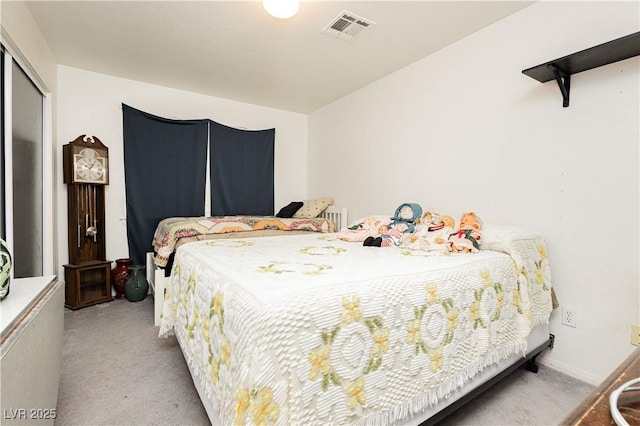 2251 Bridger St, Pahrump, NV 89048 - bedroom featuring light carpet