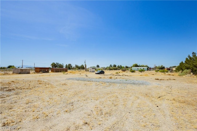 2251 Bridger St, Pahrump, NV 89048 - view of yard with a rural view