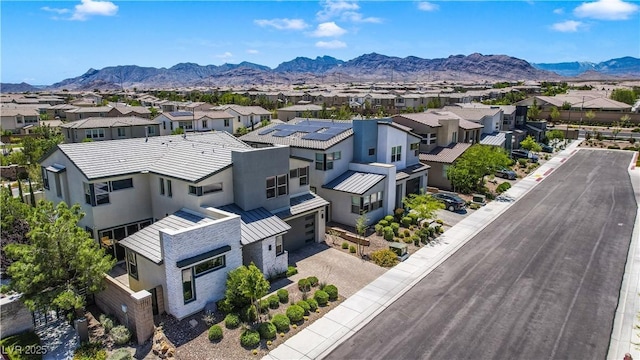 10297 Sierra Skye Ave, Las Vegas, NV 89166 - aerial perspective of suburban area with mountains